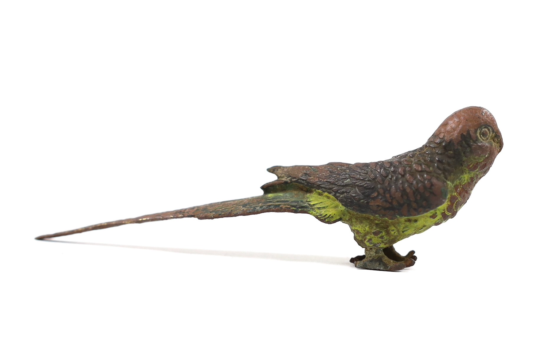 A cold painted bronze parrot, 12cm long